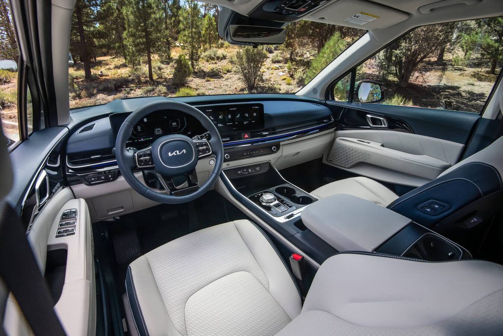 2026 Kia Carnival Hybrid interior dashboard and VIP lounge seating configuration